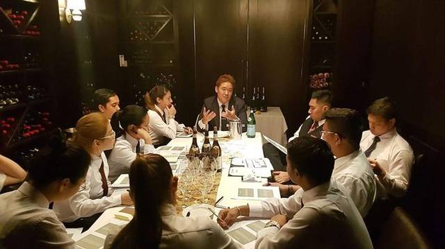 Youngbock Lee leading a wine training session in Singapore